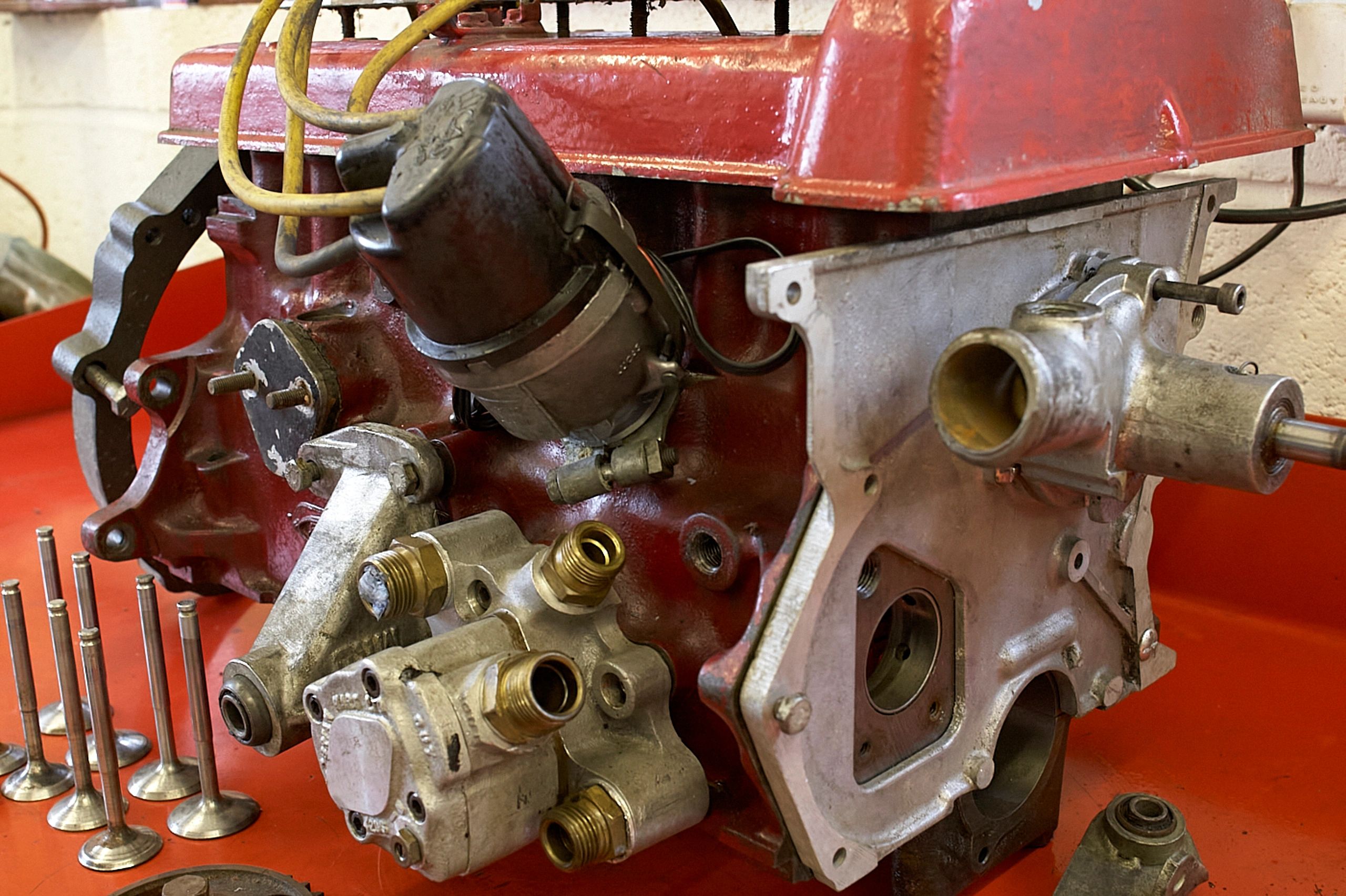 Close-up of a car engine in a service bay